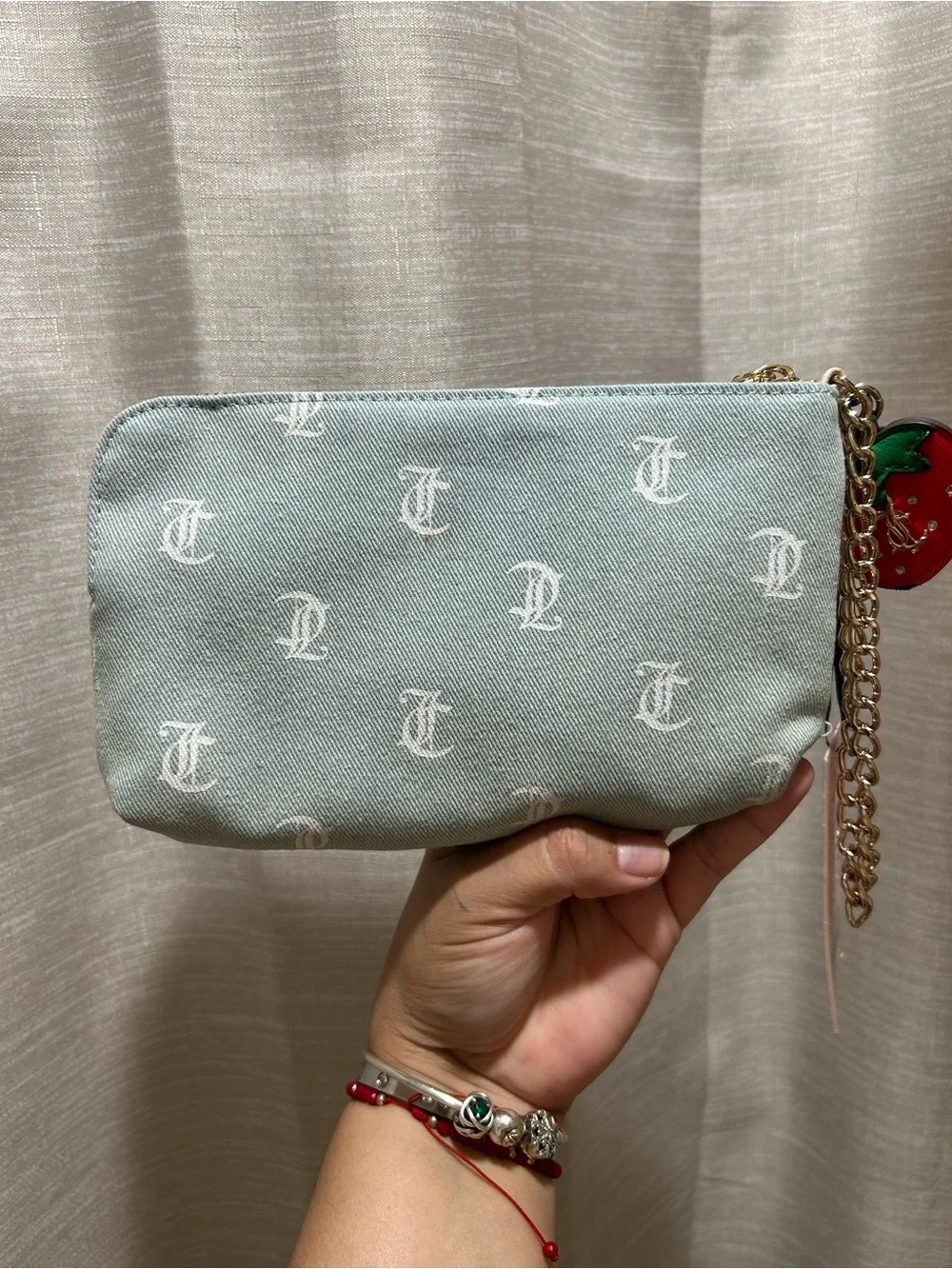 Juicy Couture Light Blue Monogram Cosmetic Wristlet with Strawberry Charm